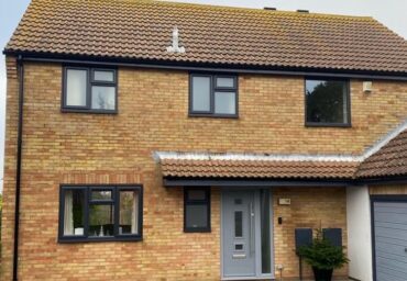 new installation of double glazed glass and windows, with a composite door