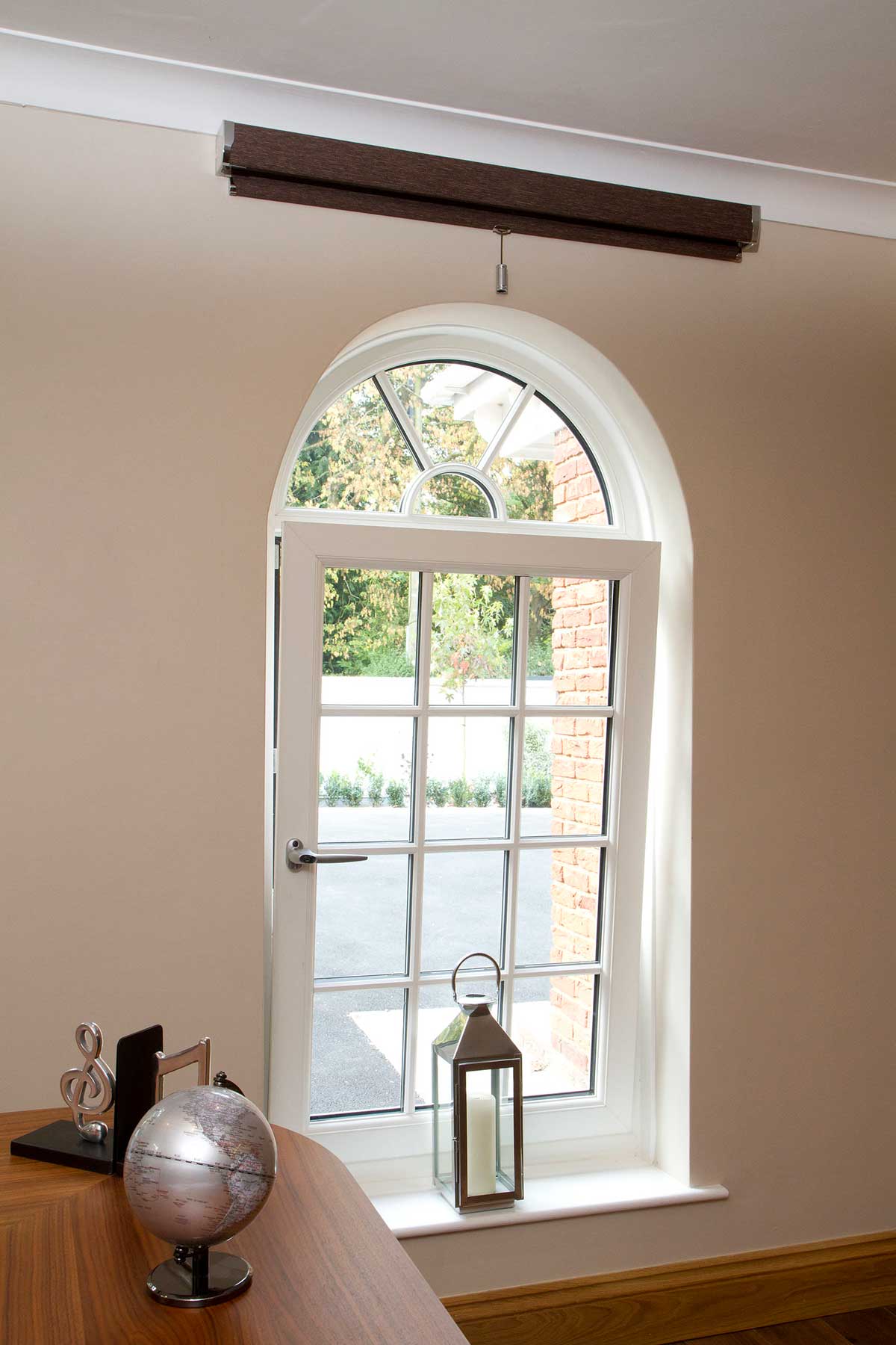 upvc tilt and turn window, installed with a lovely curved glass above
