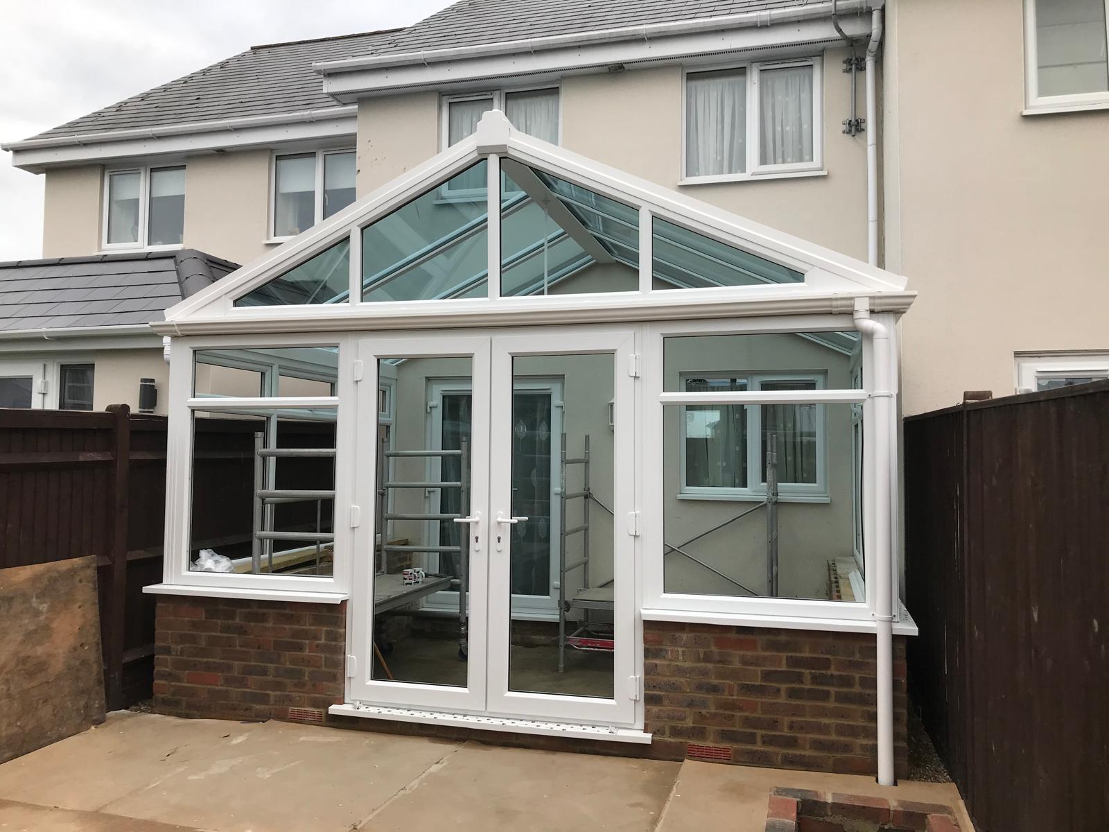 new conservatory with french doors