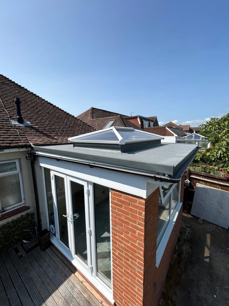 new orangery roof installation in polegate with roof lantern, new extension