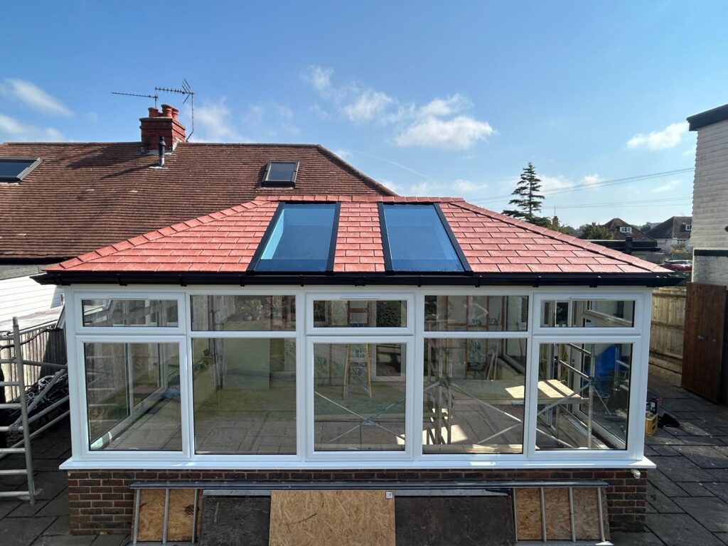 terracotta tile replacement roof with 2 glass panels