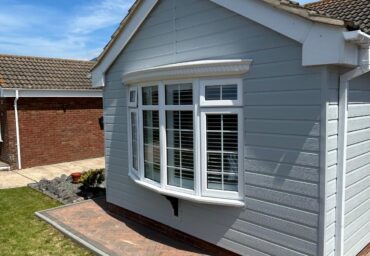 upvc cladding with a bay upvc window