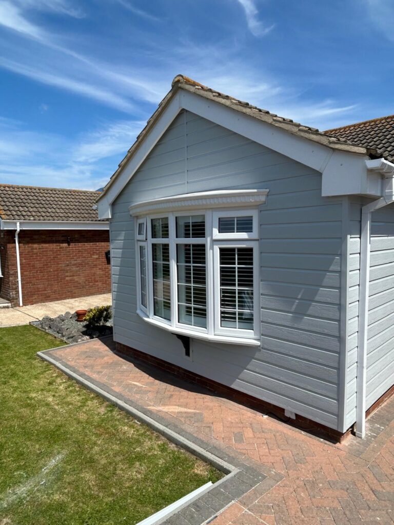 upvc cladding with a bay upvc window