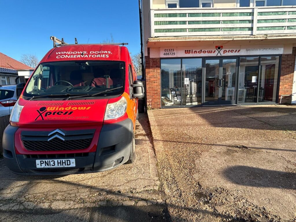 front of store image of work van and shop