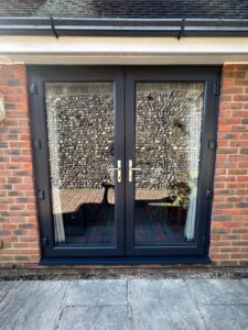 new installed upvc french door in black out white in