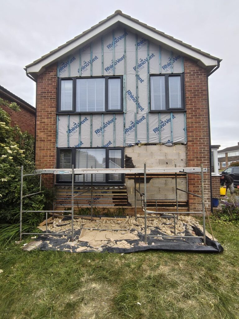 Exterior wall to be knocked out and insulation installed with a timber frame. prep work
