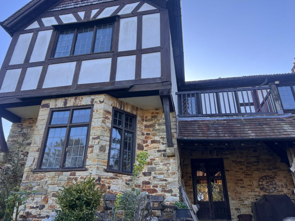 Outdated window frames before black aluminium upgrade