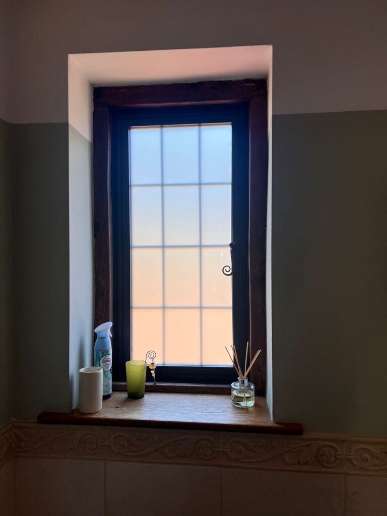 Inside view of newly fitted double glazed aluminium windows providing enhanced insulation and a contemporary look.