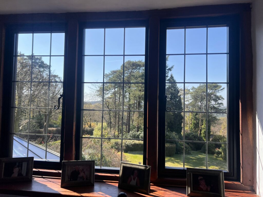 Inside view of newly fitted double glazed aluminium windows providing enhanced insulation and a contemporary look.