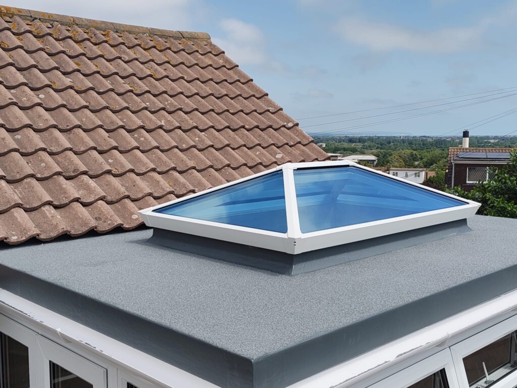 Flat roof extension with roof lantern installed on a bungalow in Eastbourne
