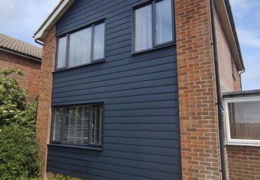 Completed uPVC cladding installation with modern, clean finish on the Eastbourne home.