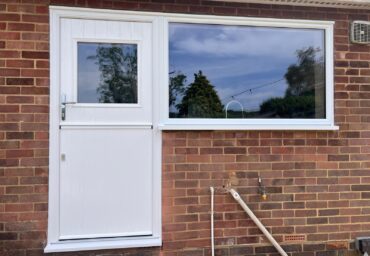 new composite stable door installed with upvc window to suite