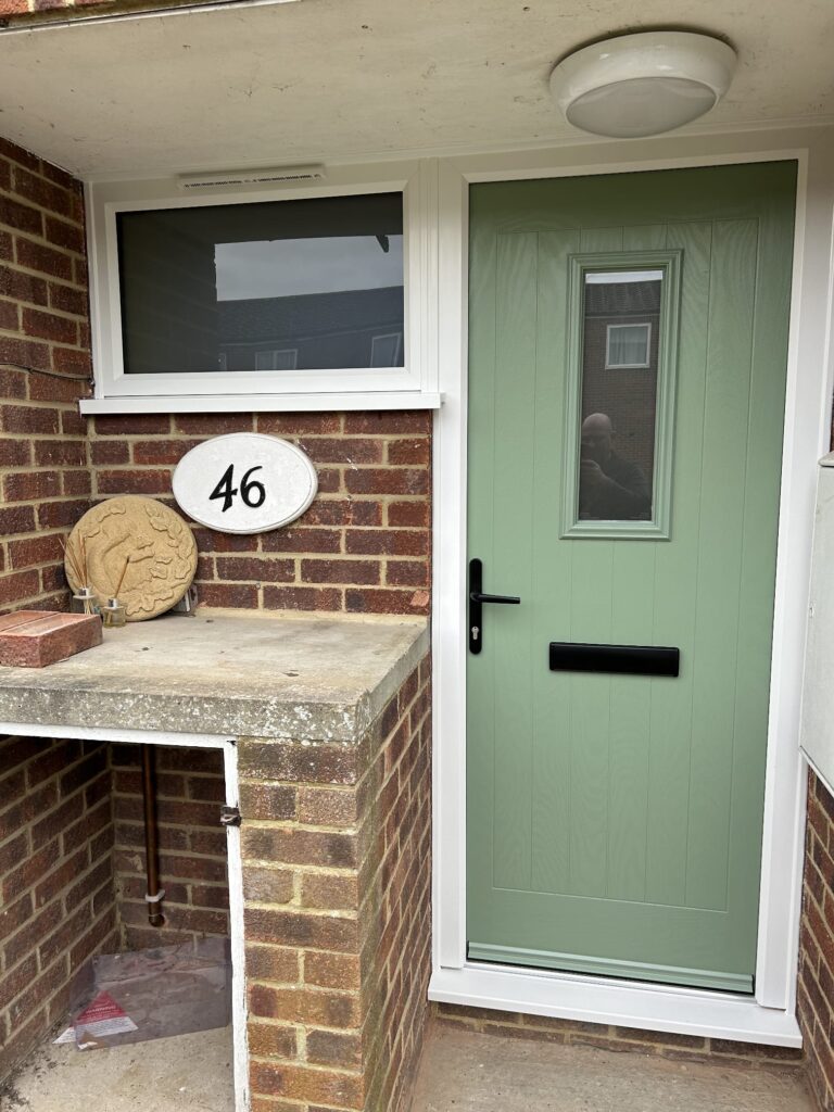 new composite door installed with green colour finished