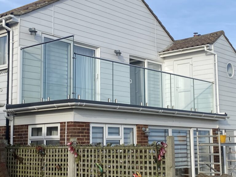 new glass Balustrade balcony installed onto flat roof