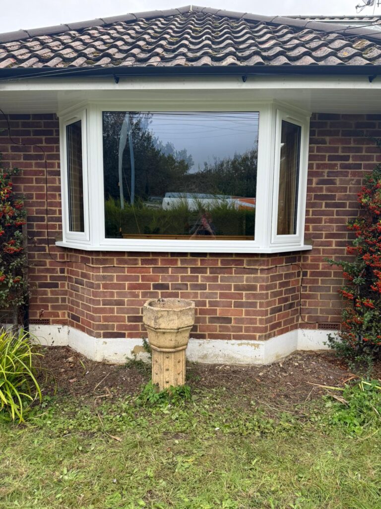 upvc bay window installed in white with clear glass