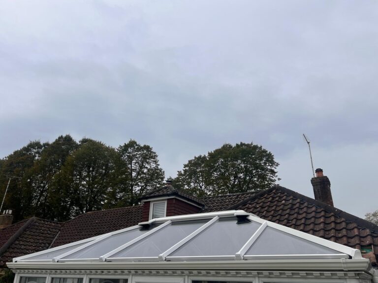 replacement glass roof installed with new frame and box gutter