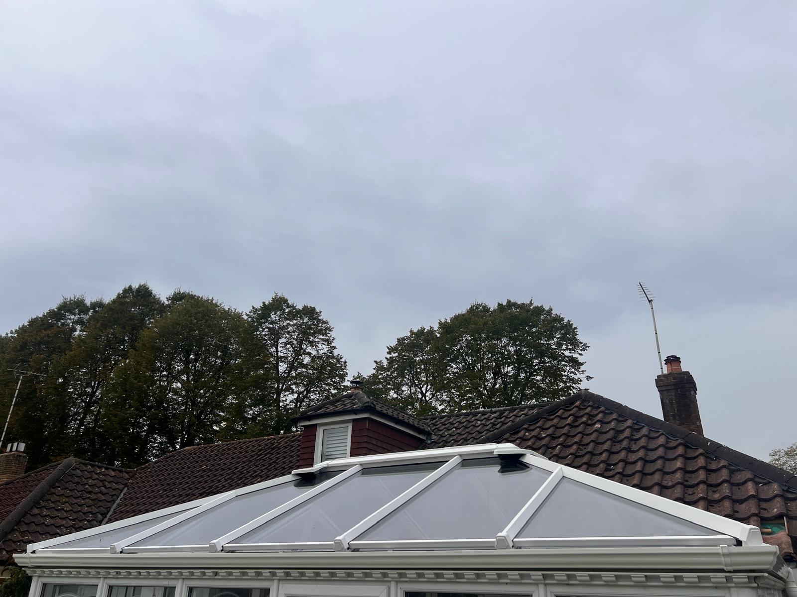 replacement glass roof installed with new frame and box gutter