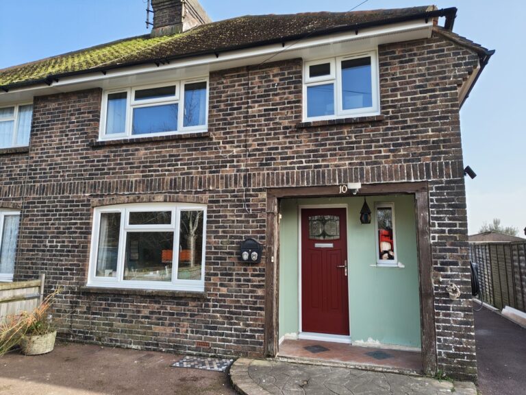 full house redo, new front composite door with windows and fasica and soffits