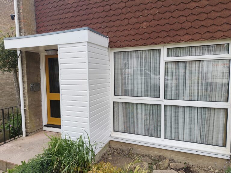 side view of new white upvc cladding installed
